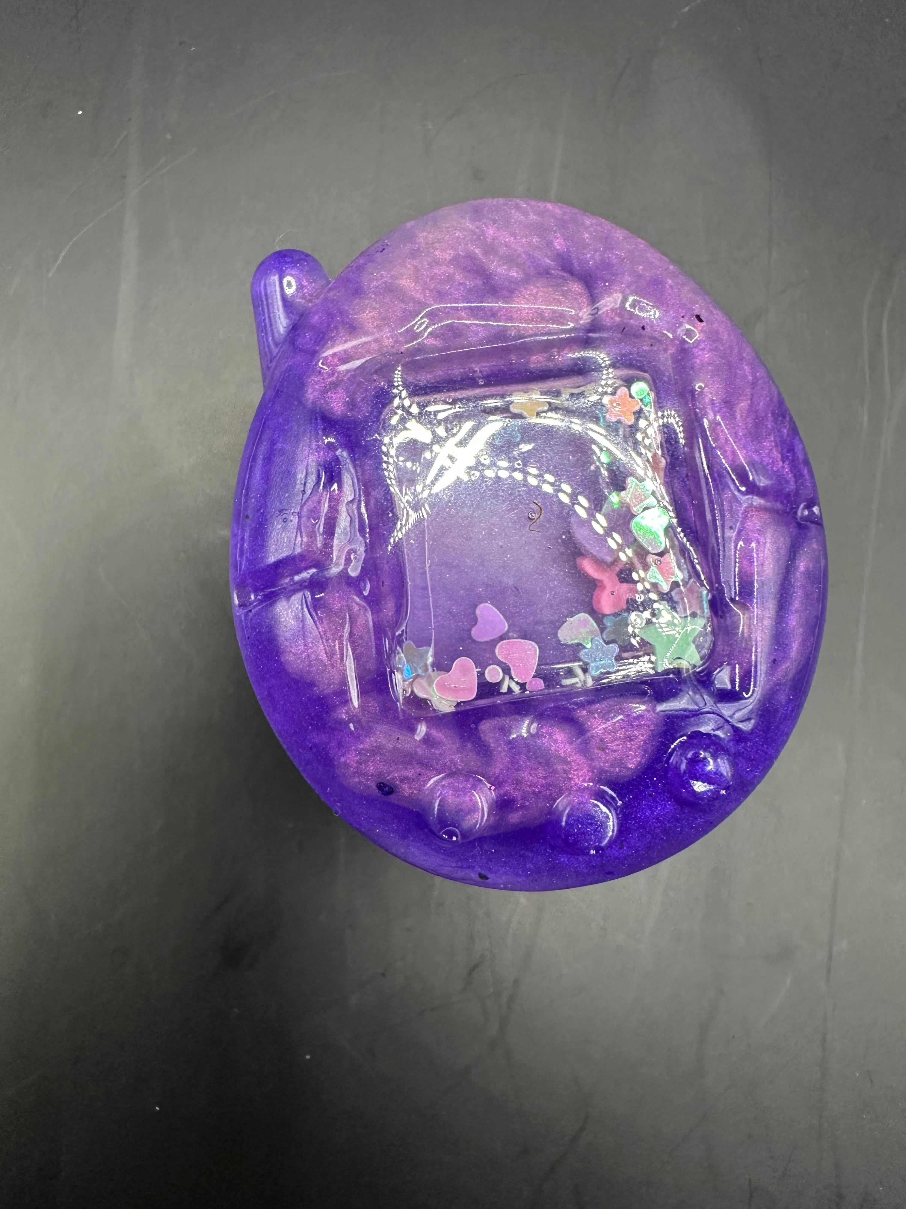 Tamagotchi dry shaker phone grip